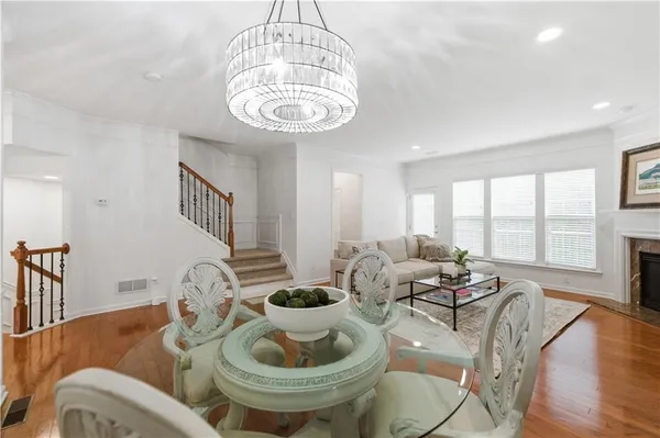 a room with furniture and a wooden floor