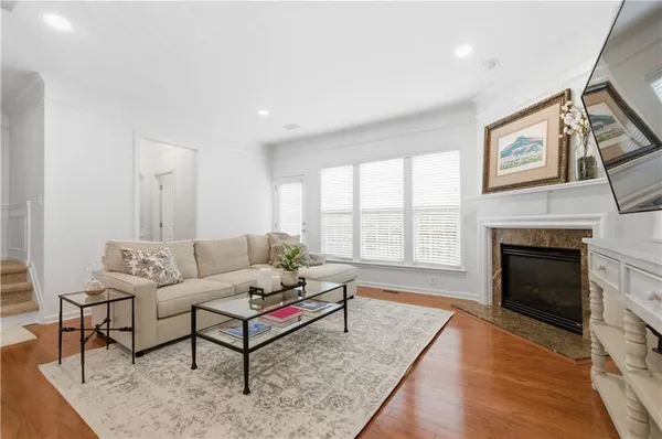 a utility room with cabinets washer and dryer