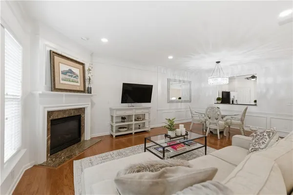 a view of a pathway along a house with wooden floor