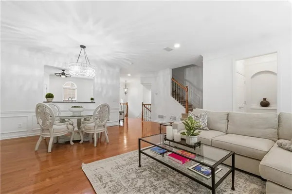 a front view of a residential apartment building with a yard