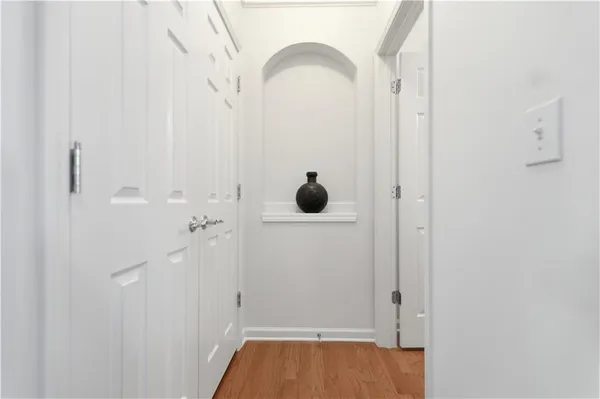 a city street lined with buildings and trees