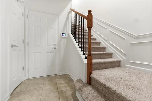 a view of swimming pool with outdoor seating and plants