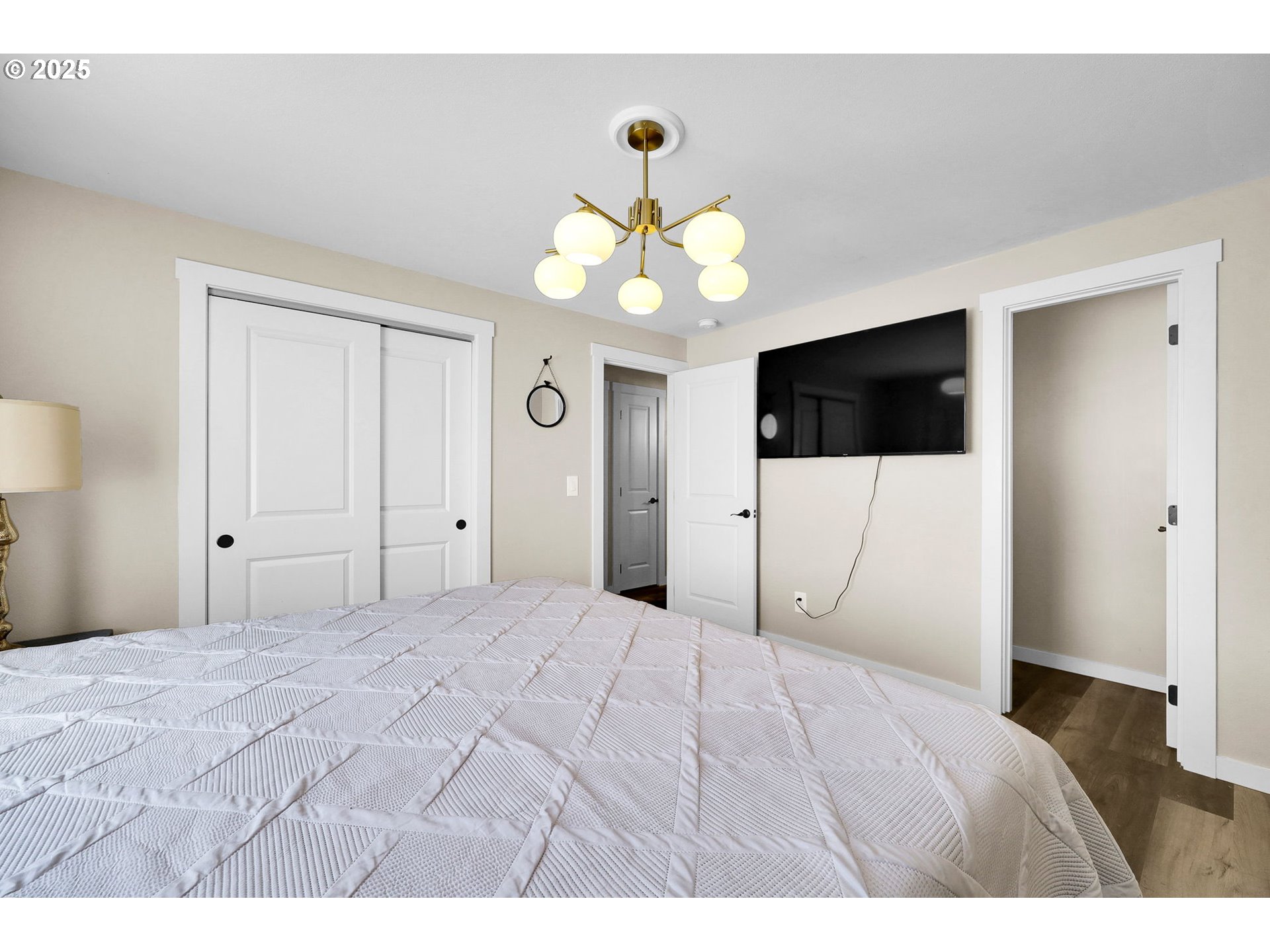 3045 Pheasant Boulevard Springfield, OR 97477 - Photo 23 of 43 a bedroom with a bed and a flat screen tv
