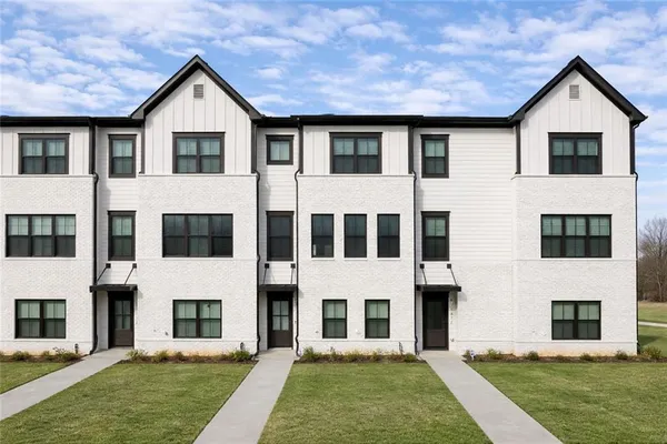 a view of house with yard