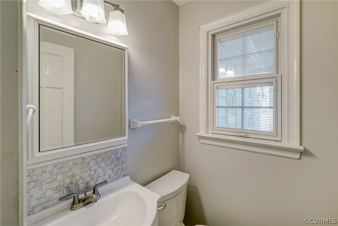 11411 Rochelle Road Chester, VA 23831 - Photo 36 of 50 a bathroom with a sink and a toilet