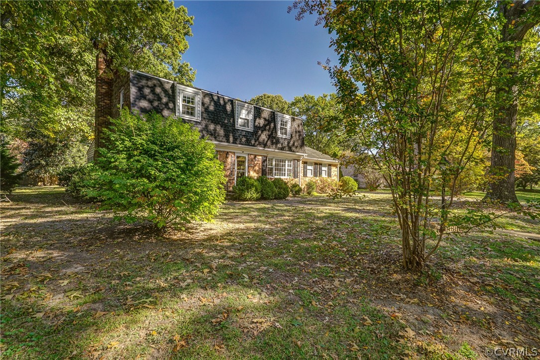 11411 Rochelle Road Chester, VA 23831 - Photo 46 of 50 a view of a house with a yard