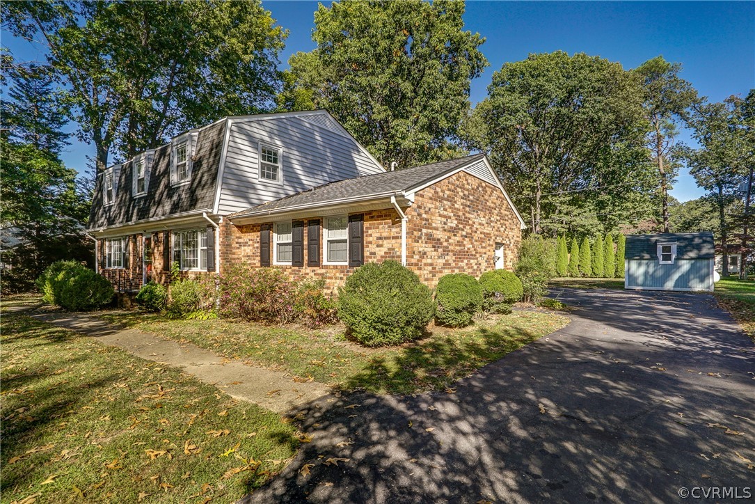 11411 Rochelle Road Chester, VA 23831 - Photo 48 of 50 a view of a house with a yard