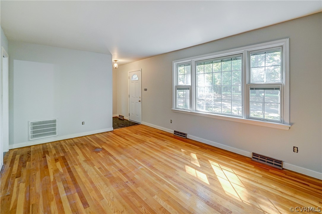 11411 Rochelle Road Chester, VA 23831 - Photo 7 of 50 a bedroom with a bed and a window