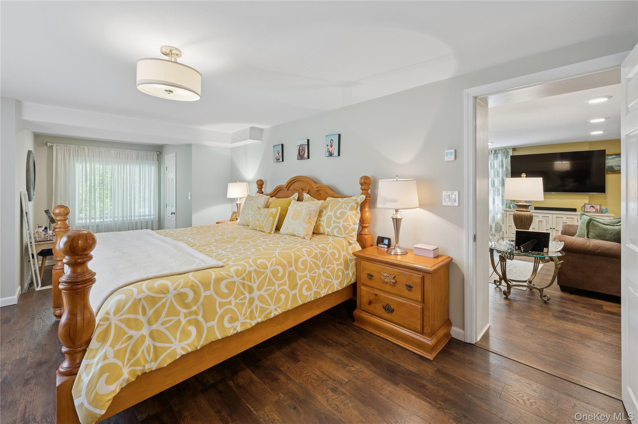 123 Pleasant Road Lake Peekskill, NY 10537 - Photo 15 of 50 a bedroom with a bed and wooden floor