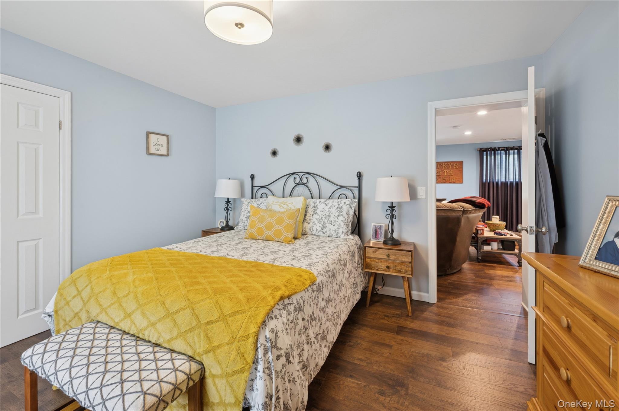 123 Pleasant Road Lake Peekskill, NY 10537 - Photo 25 of 50 a bedroom with bed and wooden floor