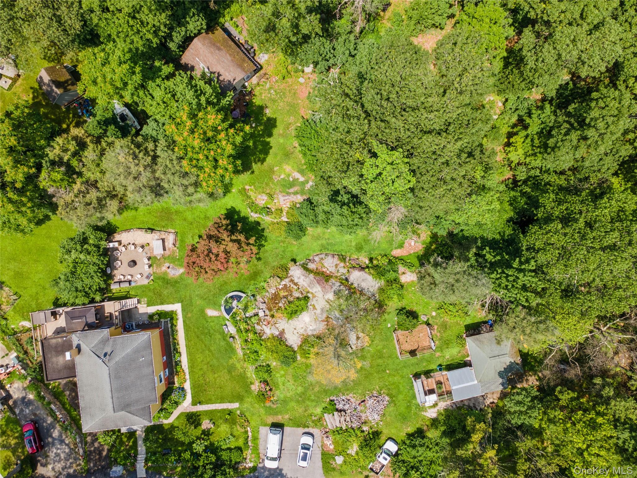 123 Pleasant Road Lake Peekskill, NY 10537 - Photo 29 of 50 an aerial view of residential house with outdoor space and trees all around