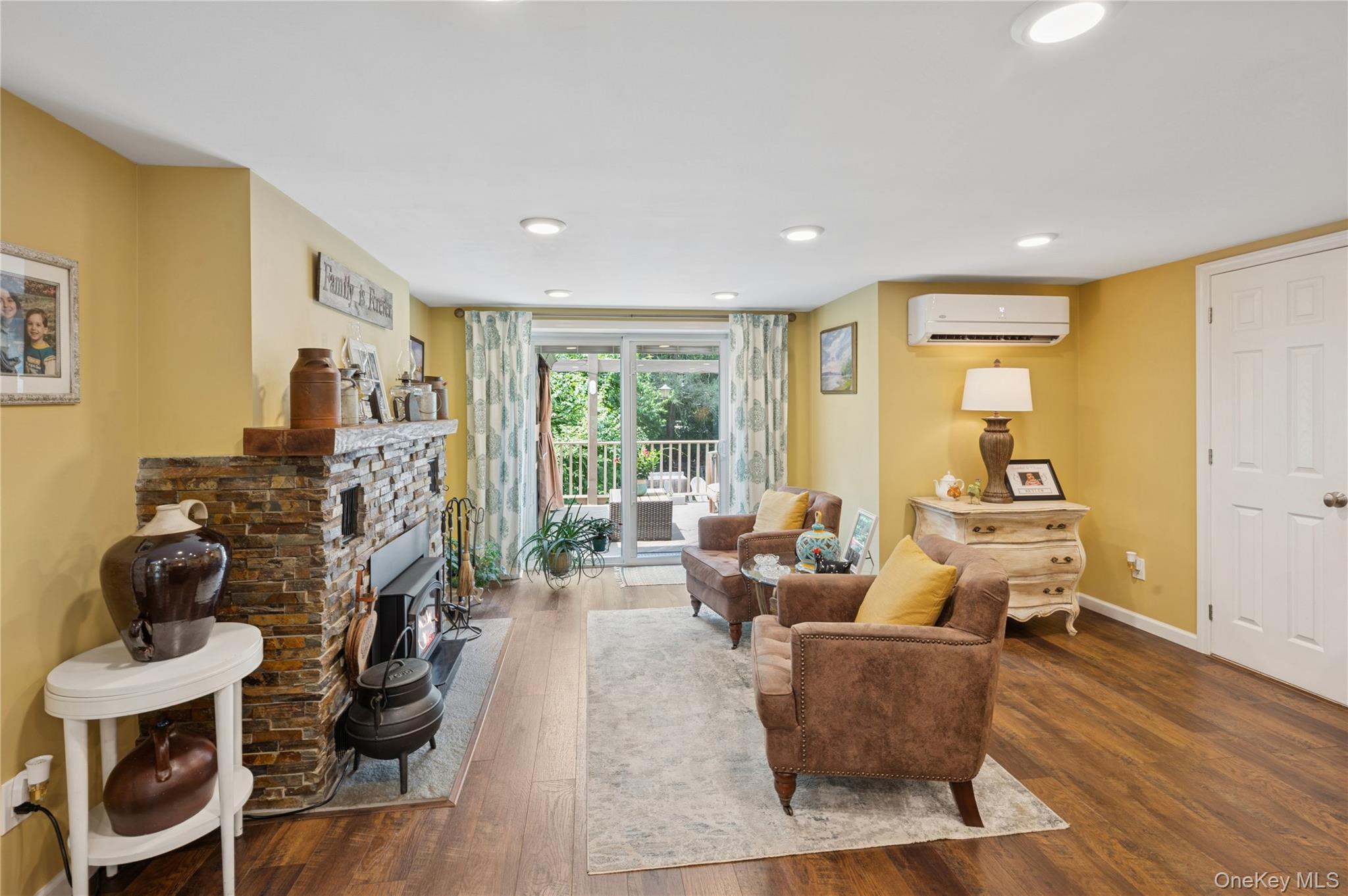 123 Pleasant Road Lake Peekskill, NY 10537 - Photo 4 of 50 a living room with furniture and wooden floor
