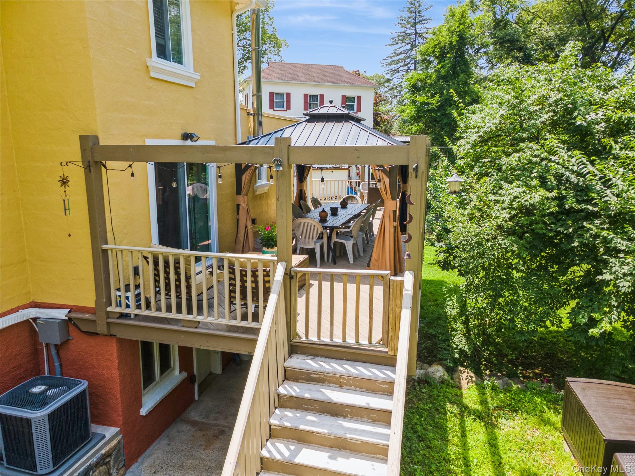 123 Pleasant Road Lake Peekskill, NY 10537 - Photo 44 of 50 a view of a house with a porch