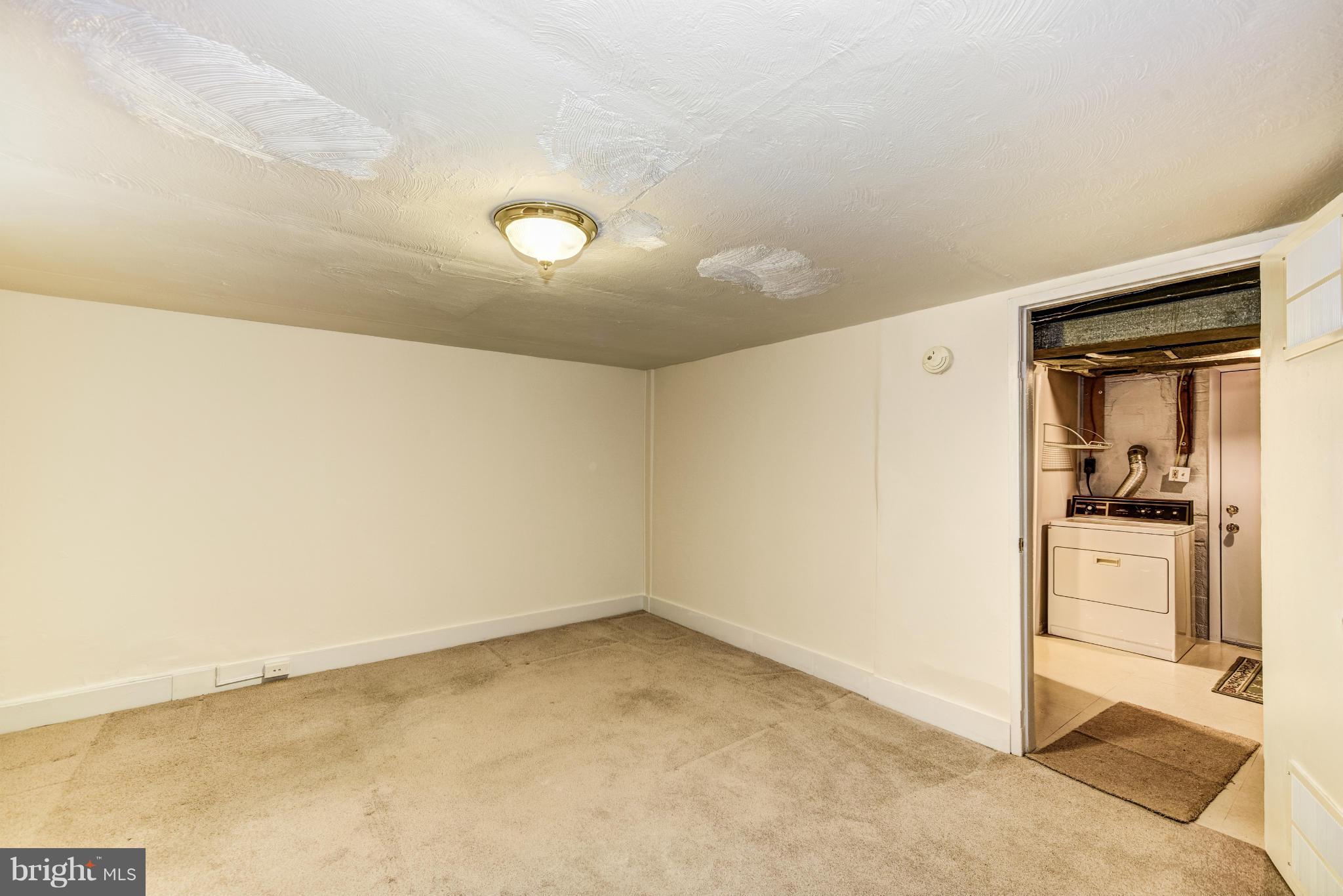 12036 Claridge Road Silver Spring, MD 20902 - Photo 21 of 27 a view of a room with a empty space