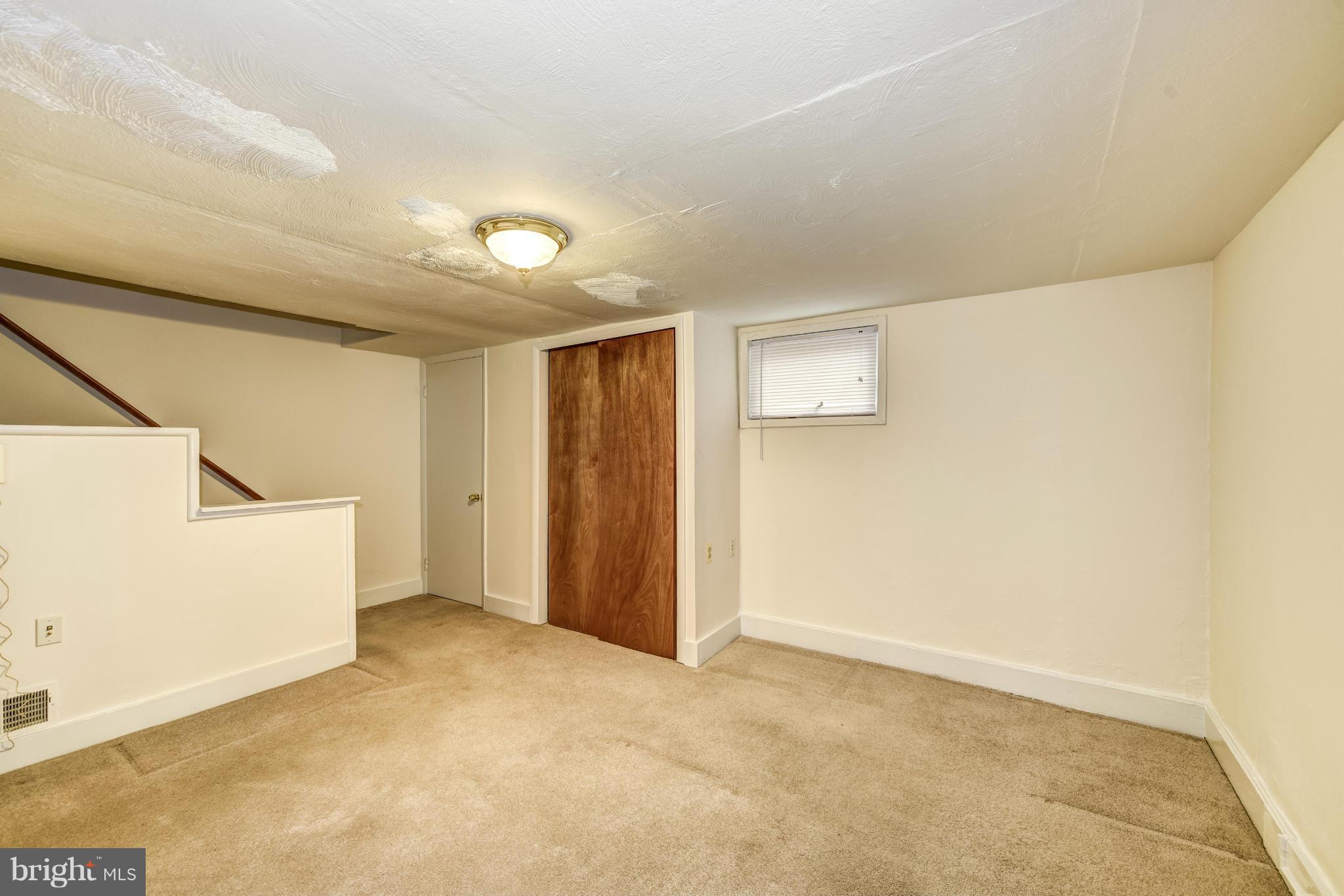12036 Claridge Road Silver Spring, MD 20902 - Photo 23 of 27 a view of an empty room