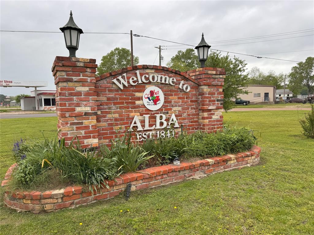 Lot 25 Rains County Road 2610 Alba, TX 75410 - Photo 2 of 14 a view of a street with a building in the background