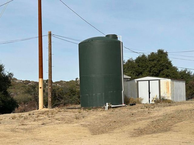 a view of a house with a snow