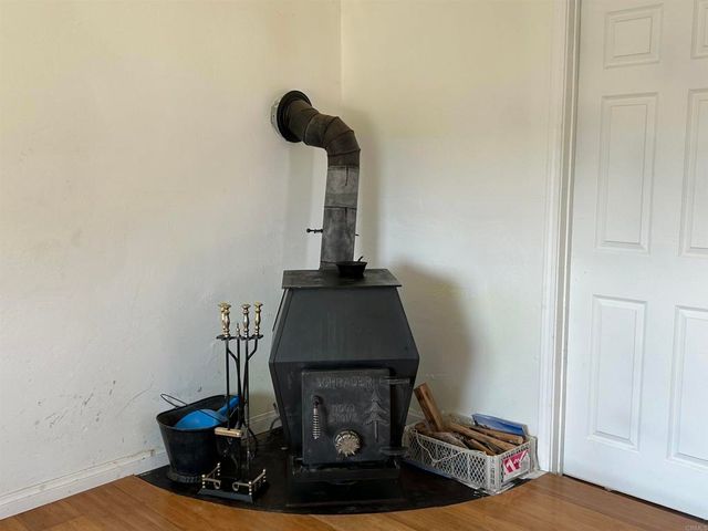 a room with a closet and wooden floor