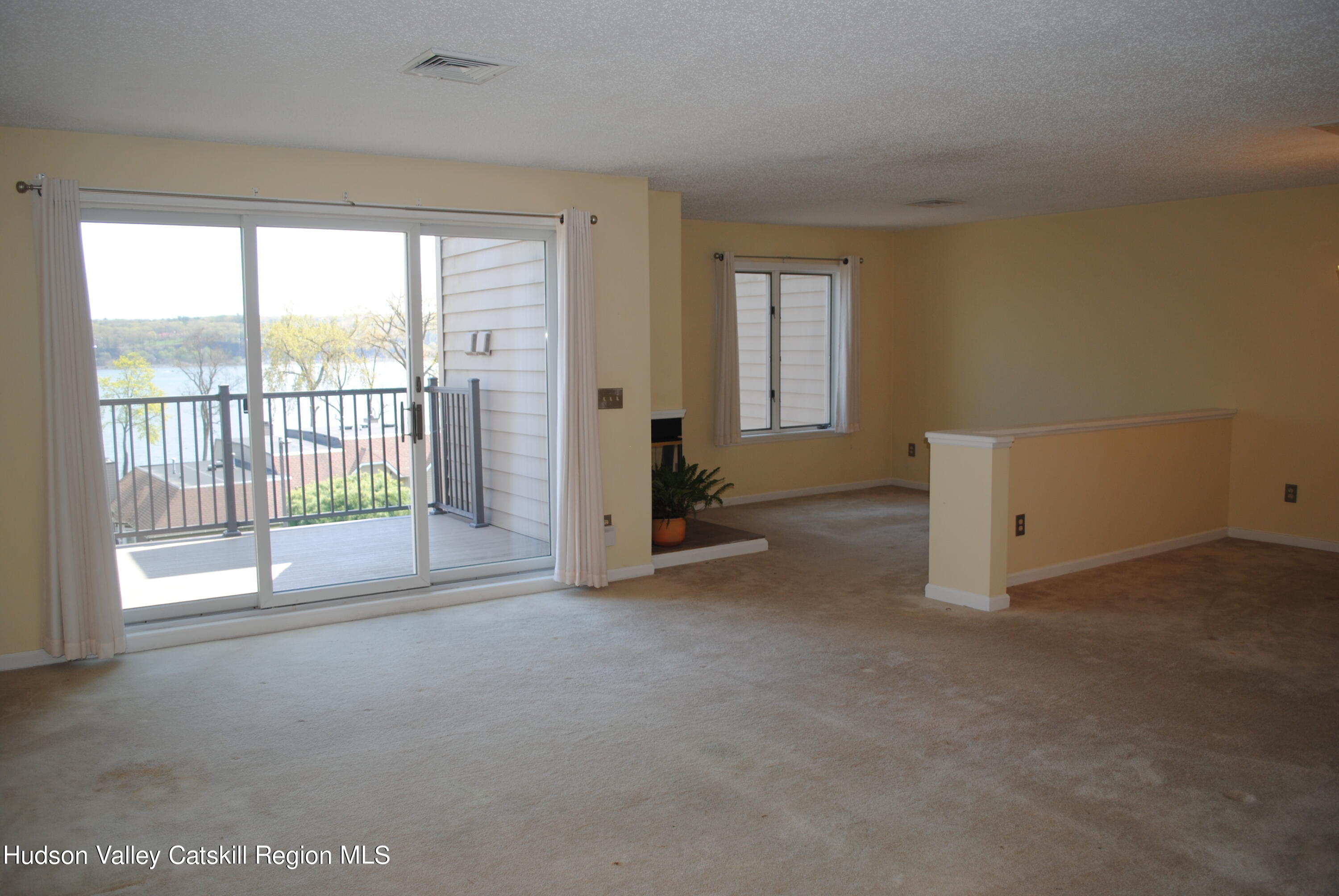 75 Riverview Port Ewen, NY 12466 - Photo 12 of 35 a view of empty room with floor to ceiling window