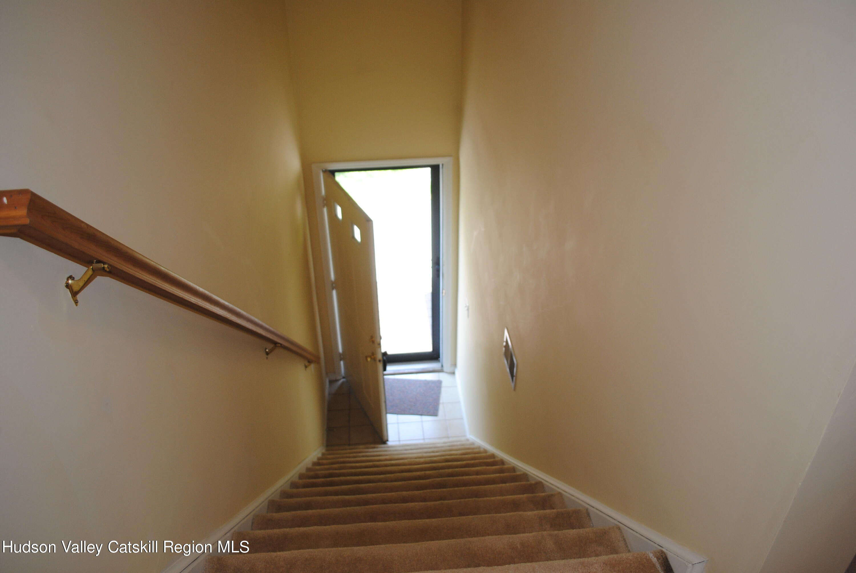 75 Riverview Port Ewen, NY 12466 - Photo 29 of 35 a view of a hallway with wooden floor and staircase