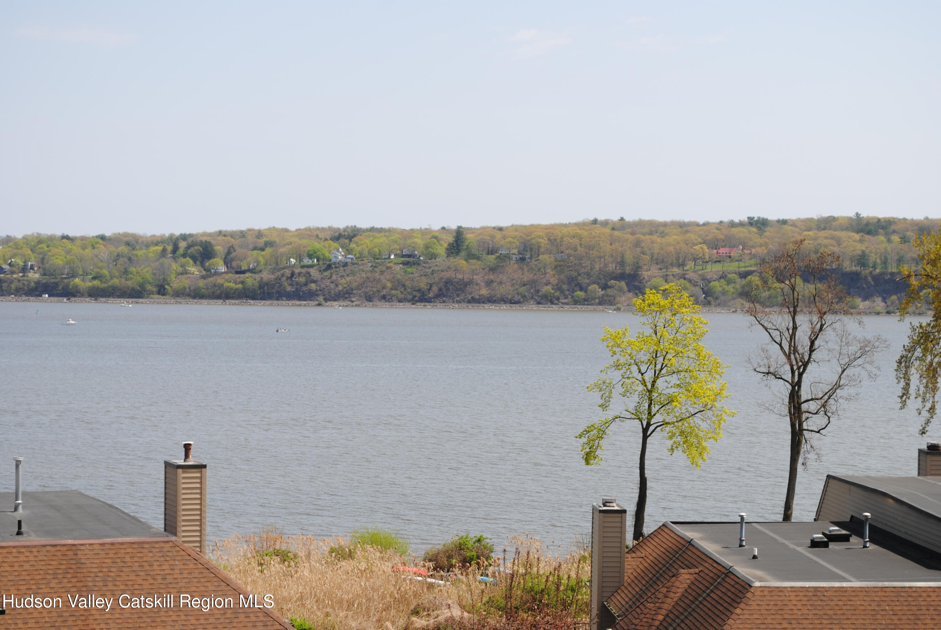 75 Riverview Port Ewen, NY 12466 - Photo 7 of 35 a view of a lake with a mountain in the back