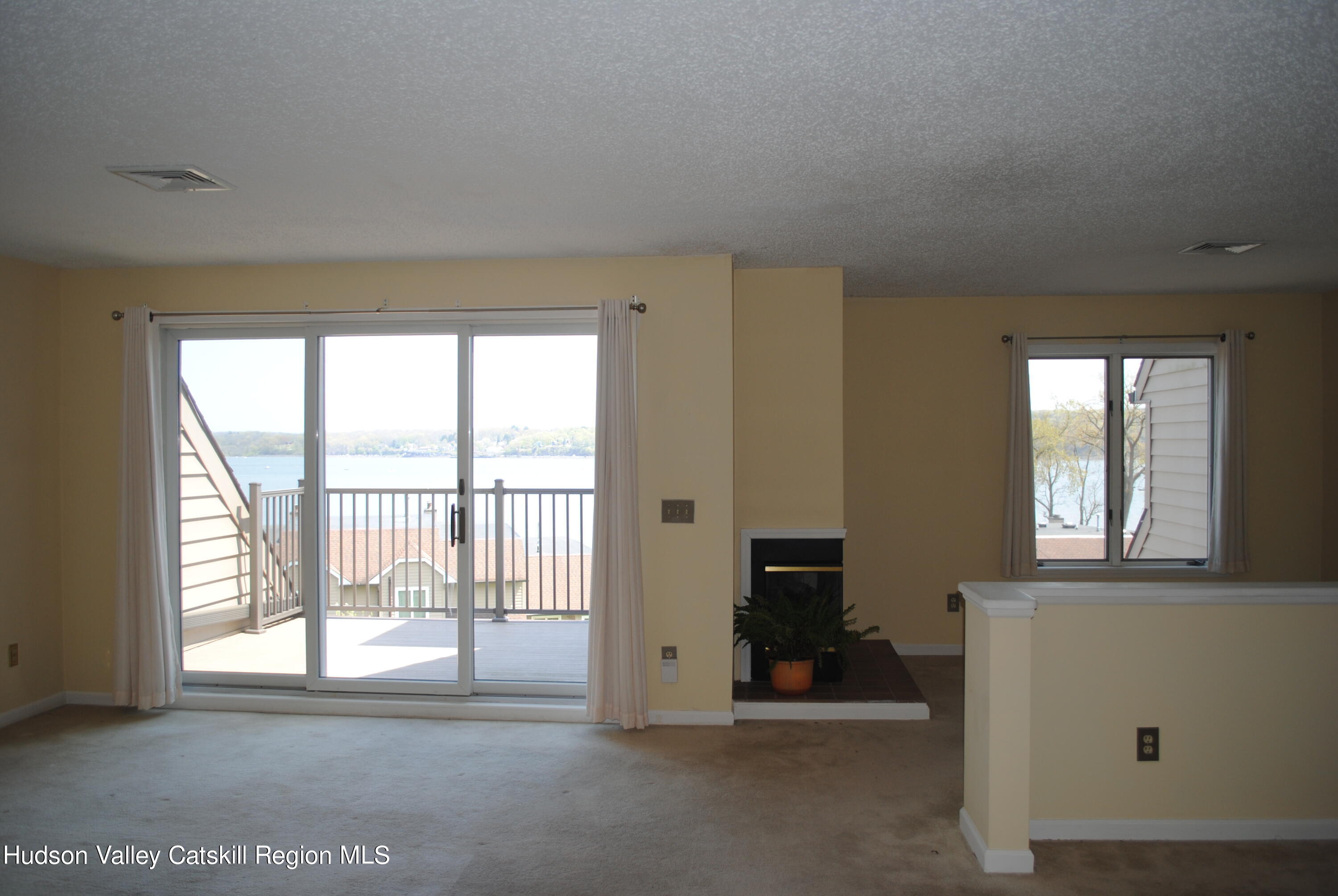 75 Riverview Port Ewen, NY 12466 - Photo 9 of 35 a view of a room with large windows