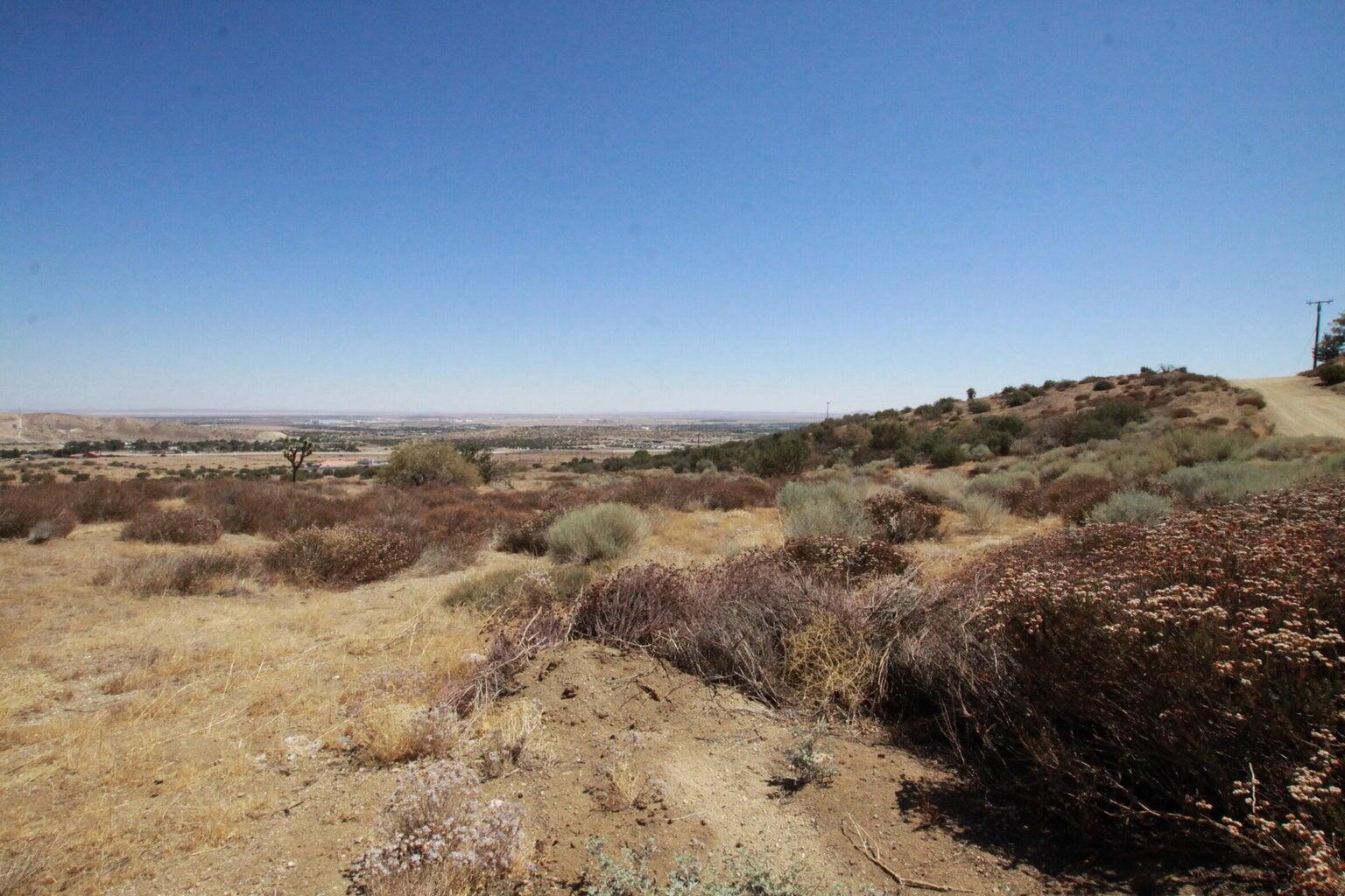 Barrel Springs Palmdale, CA 93551 - Photo 3 of 11 a view of a large mountain with mountains in the background