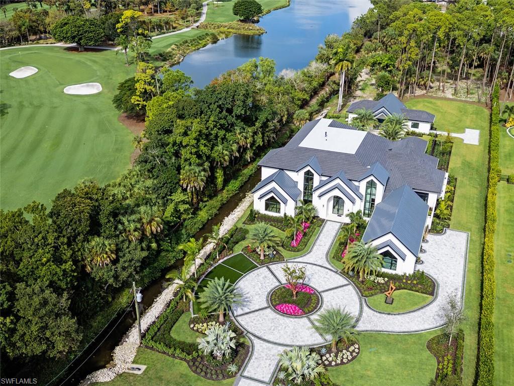 2145 Coach House Lane Naples, FL 34105 - Photo 7 of 9 an aerial view of a house with yard swimming pool and outdoor seating