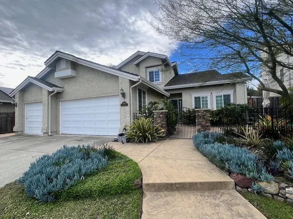 a house view with a outdoor space