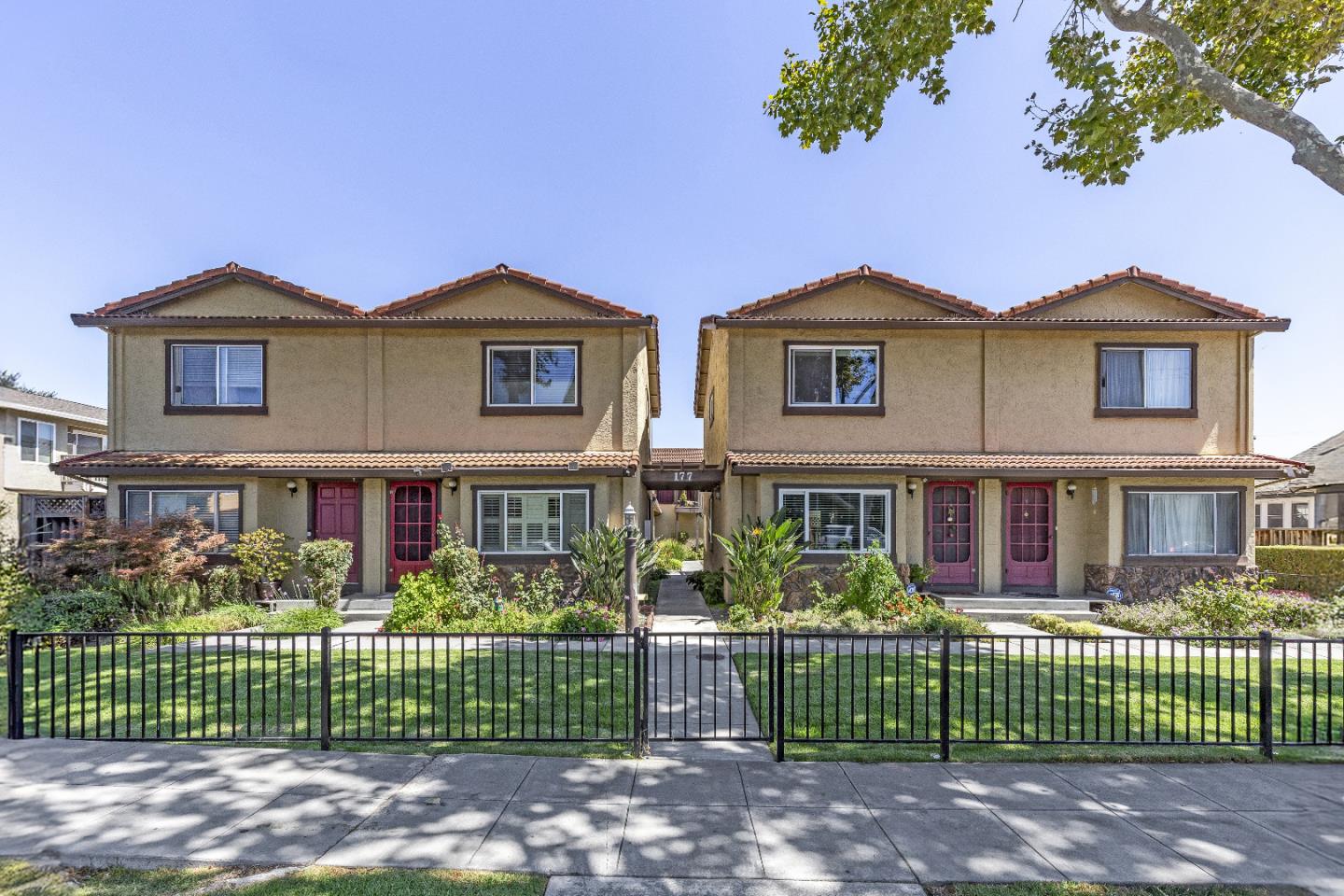 177 Monroe Street, Unit 8 Santa Clara, CA 95050 - Photo 1 of 22 a front view of a house with a garden