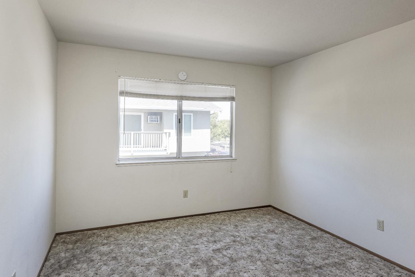 177 Monroe Street, Unit 8 Santa Clara, CA 95050 - Photo 13 of 22 an empty room with a window