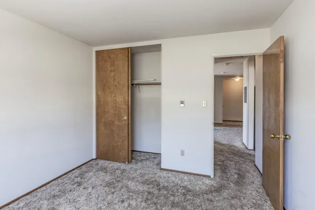 a view of a room with a hallway