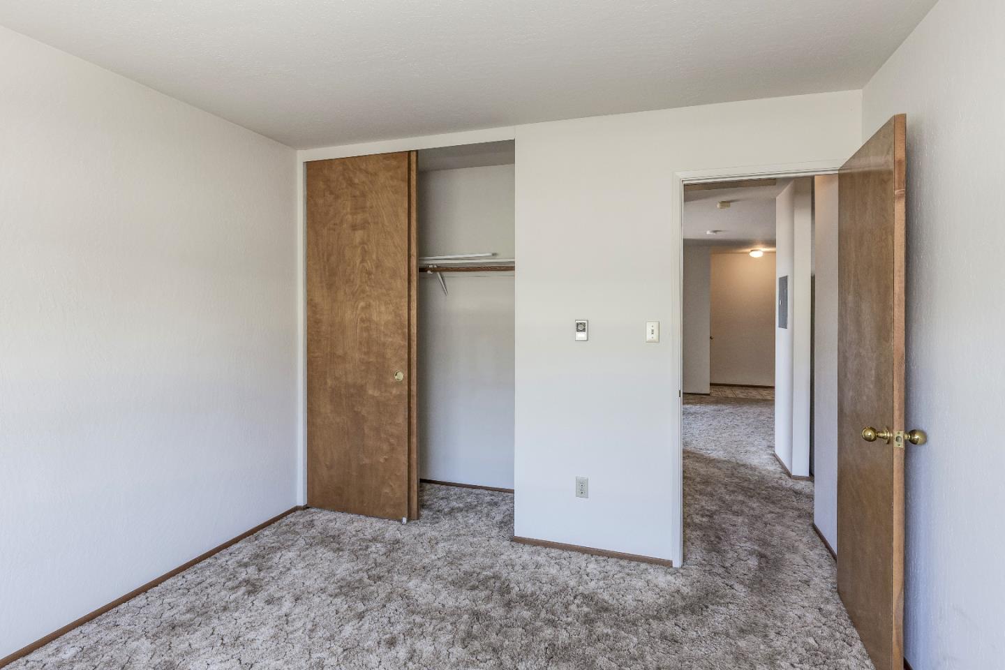 177 Monroe Street, Unit 8 Santa Clara, CA 95050 - Photo 14 of 22 a view of a room with a hallway