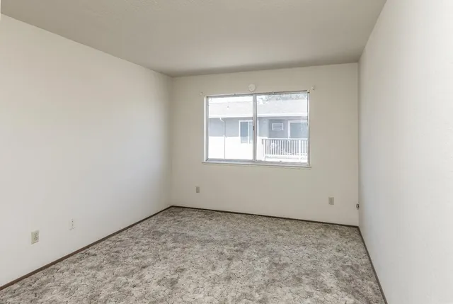 an empty room with a window