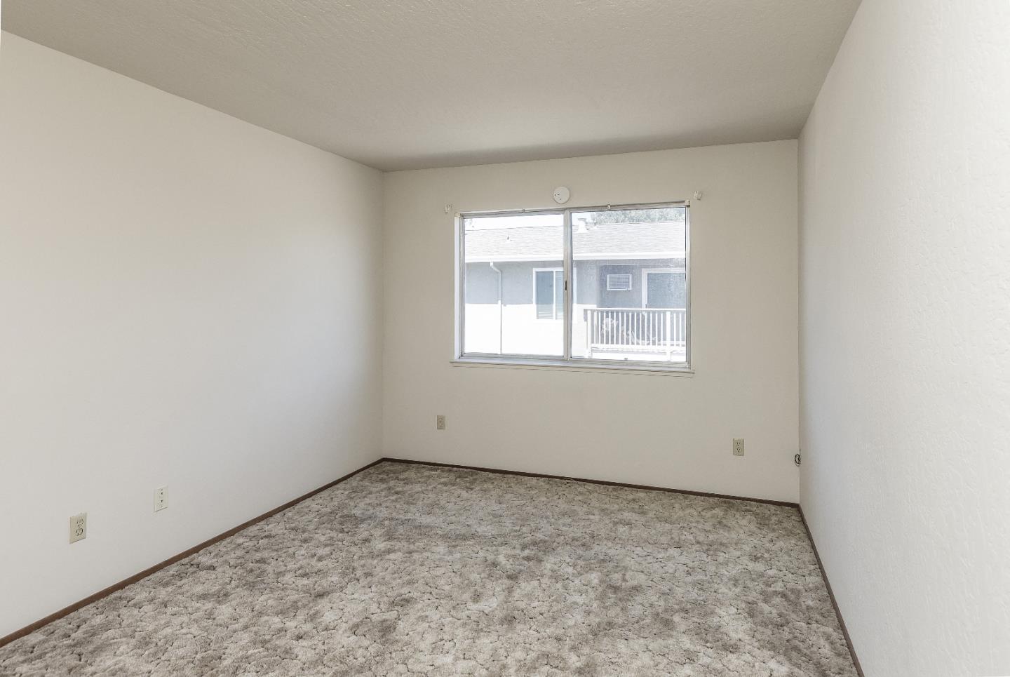 177 Monroe Street, Unit 8 Santa Clara, CA 95050 - Photo 15 of 22 an empty room with a window