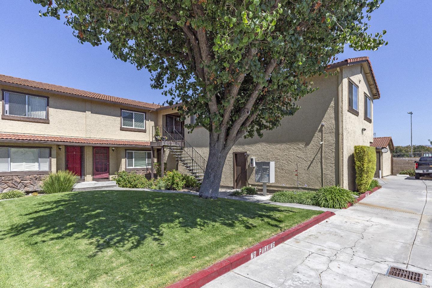 177 Monroe Street, Unit 8 Santa Clara, CA 95050 - Photo 3 of 22 a front view of a house with garden