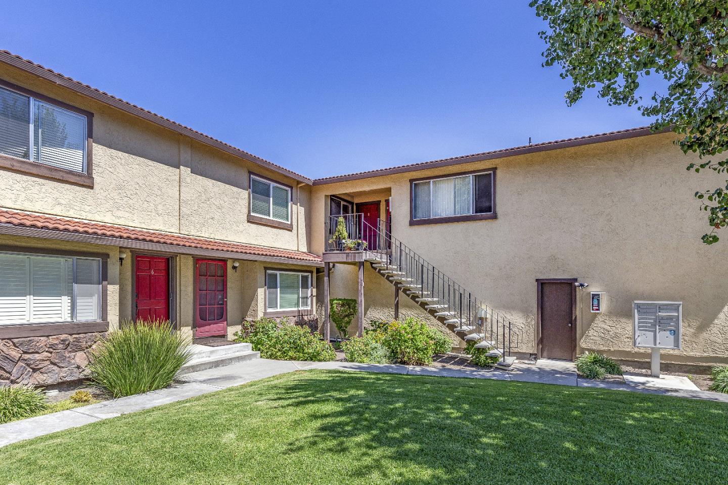 177 Monroe Street, Unit 8 Santa Clara, CA 95050 - Photo 4 of 22 a front view of house and yard with green space