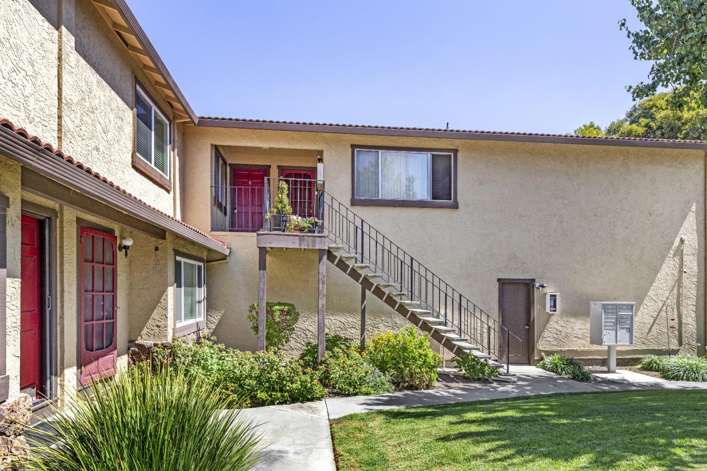 177 Monroe Street, Unit 8 Santa Clara, CA 95050 - Photo 5 of 22 a view of a house with a swimming pool
