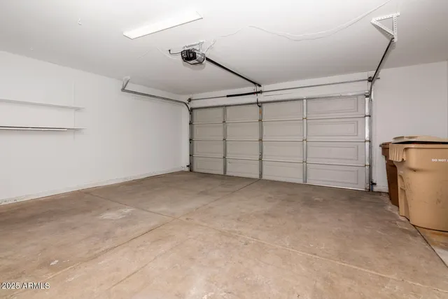 a view of a hallway with a chandelier