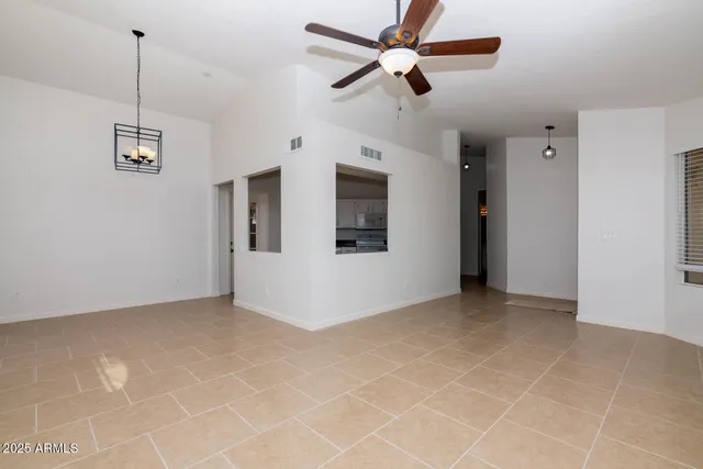a view of a room with drop ceiling
