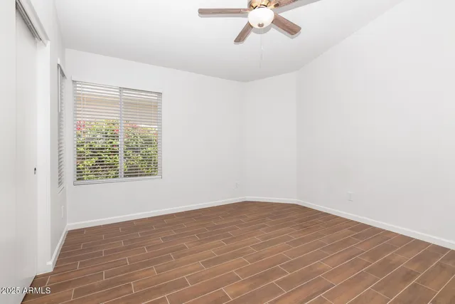 a view of a pathway both side of a house