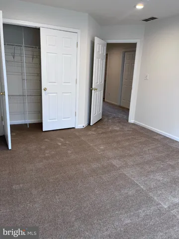 wooden floor and closet in a room