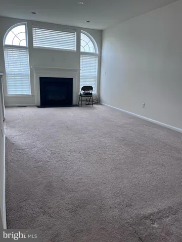 a view of a livingroom with a fireplace
