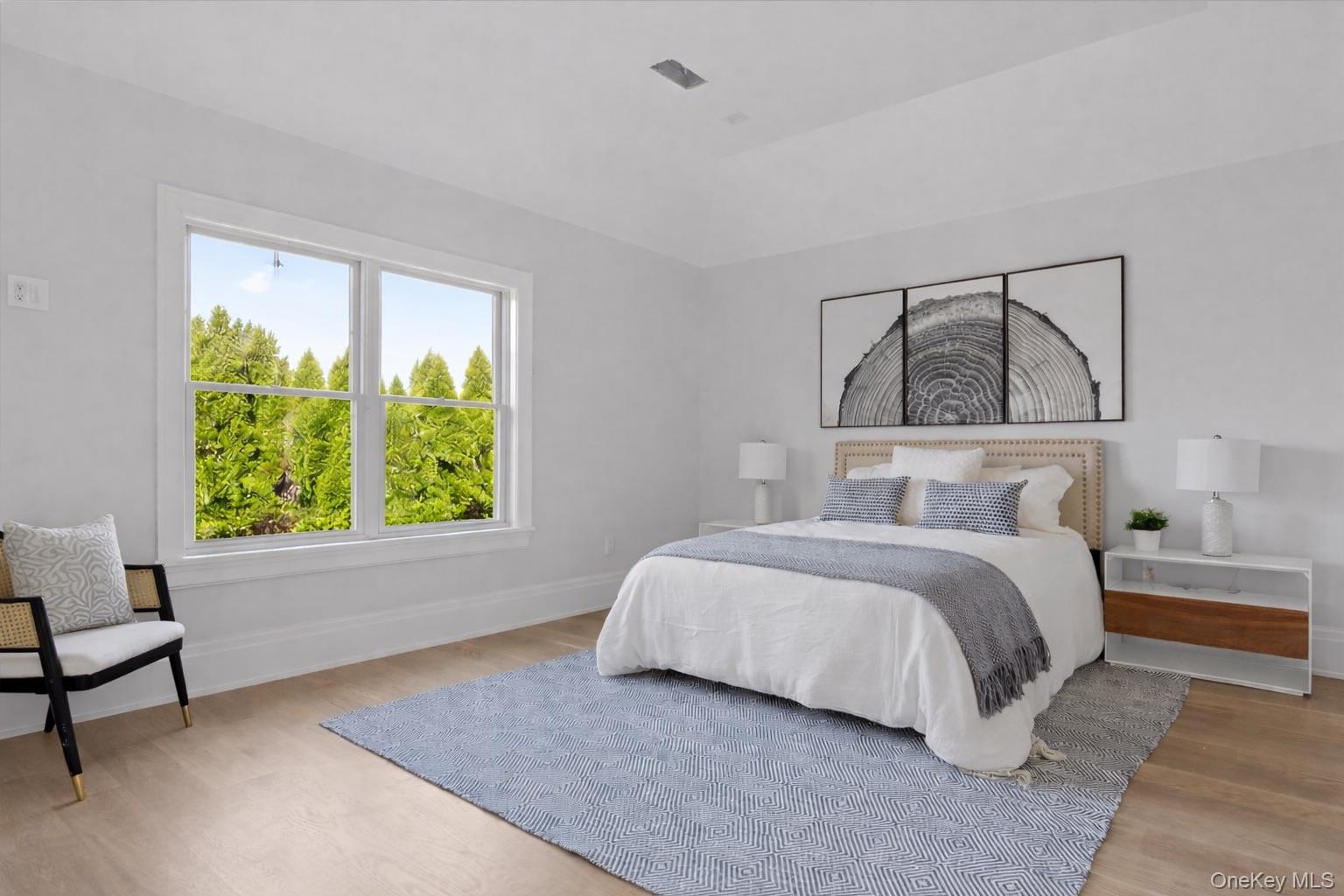 2590 Cox Neck Road Mattituck, NY 11952 - Photo 28 of 50 Generously sized guest bedroom with refined finishes throughout