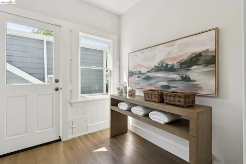 a room with furniture and wooden floor