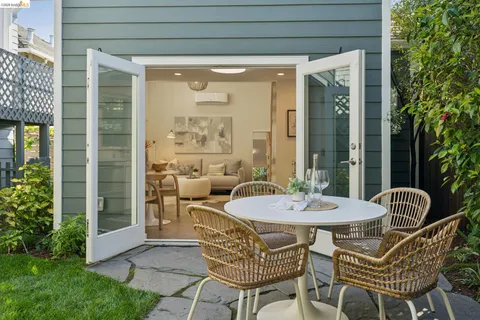 a outdoor space with patio the couches and a potted plant