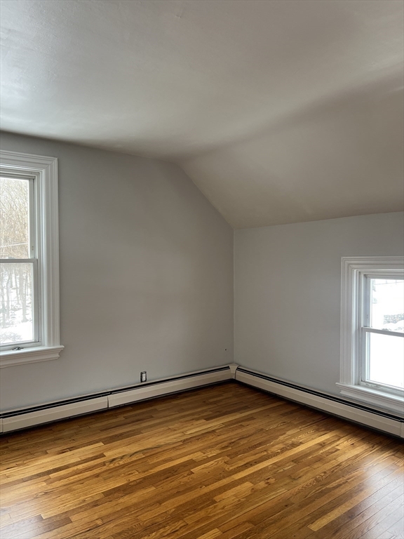 134 Bay State Road, Unit 2 Rehoboth, MA 02769 - Photo 12 of 18 a view of empty room with wooden floor and fan