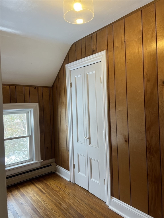 134 Bay State Road, Unit 2 Rehoboth, MA 02769 - Photo 13 of 18 an empty room with wooden floor and windows