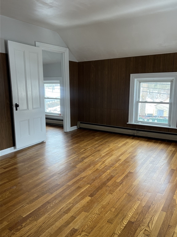 134 Bay State Road, Unit 2 Rehoboth, MA 02769 - Photo 14 of 18 an empty room with wooden floor and windows