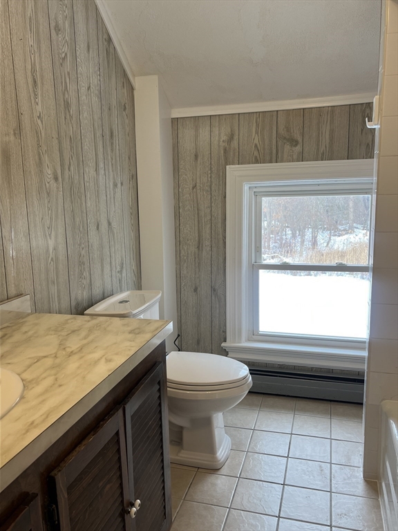 134 Bay State Road, Unit 2 Rehoboth, MA 02769 - Photo 16 of 18 a bathroom with a granite countertop sink and a toilet